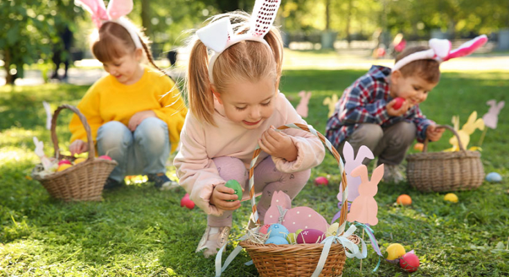 Children collecting eggs for Easter baskets