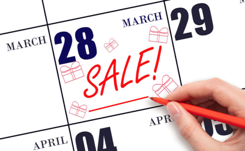 Calendar with "Sale" marked on a date