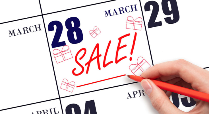 Calendar with "Sale" marked on a date