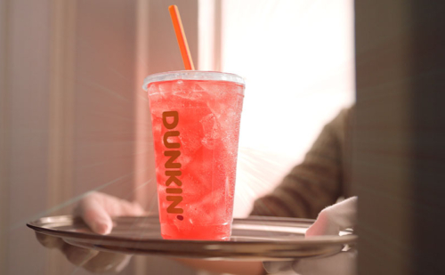 Pink Spritz Refresher from Dunkin' being served on a tray