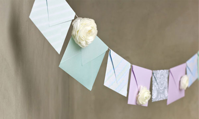 An envelope garland with silk flowers