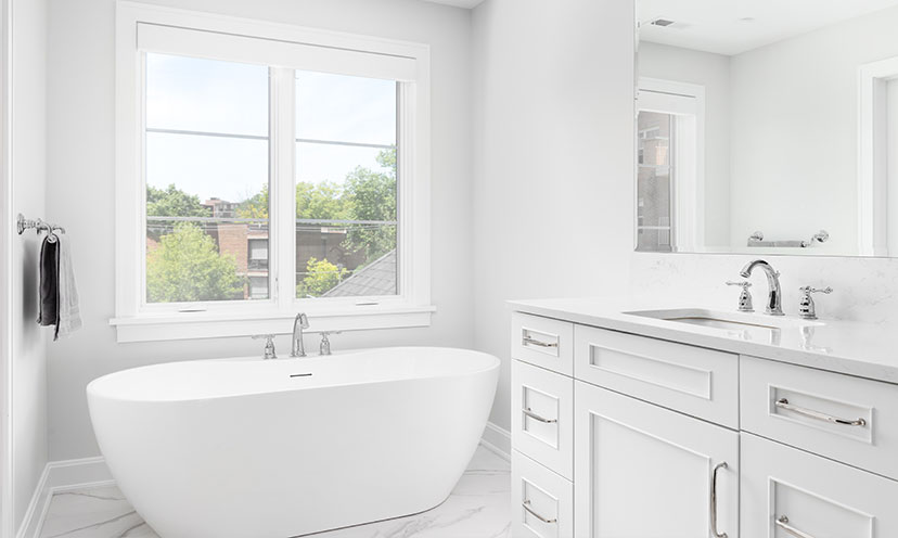 Bathroom with a free-standing bathtub